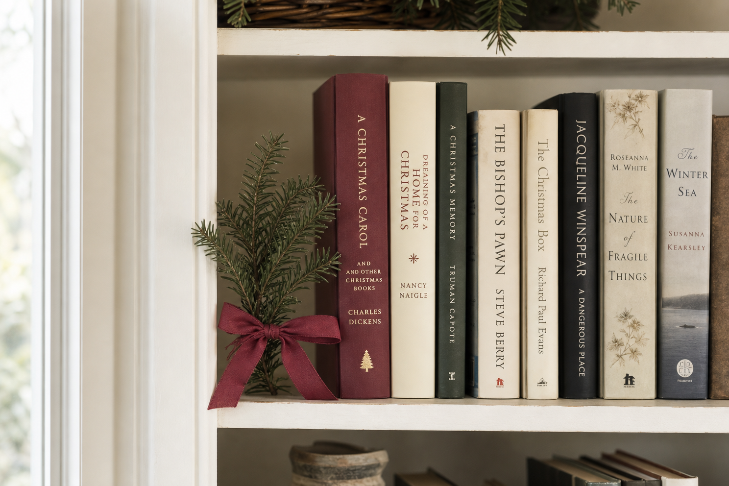 Muted Christmas color repeated between book jackets and one ribbon