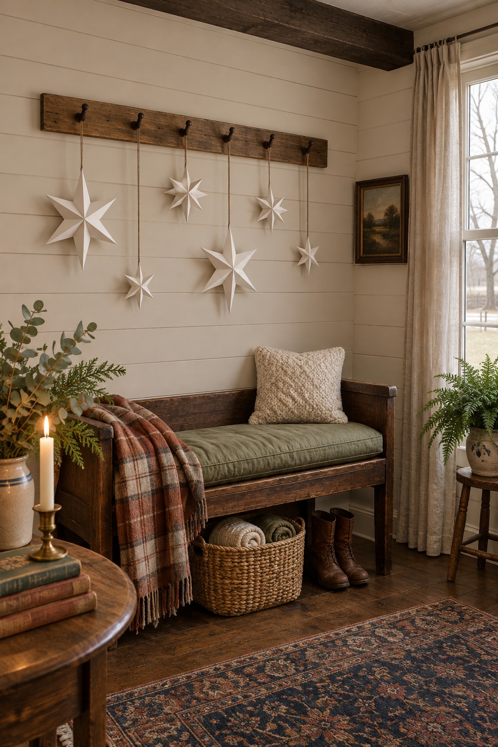 Five folded white paper stars of different sizes hanging at different heights from the pegs of a wooden peg rail above a bench